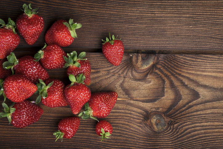 Strawberries on wooden table